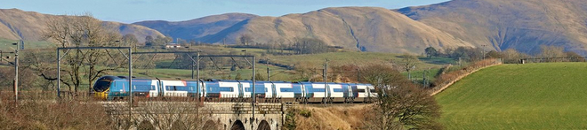 An Avanti West Coast Pendolino train travelling through the UK to London